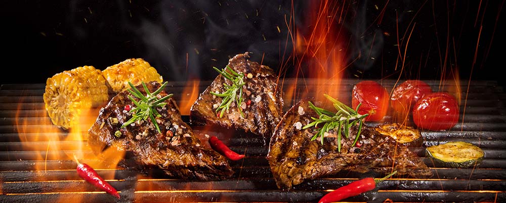 Flame grilled meat and vegatables picture